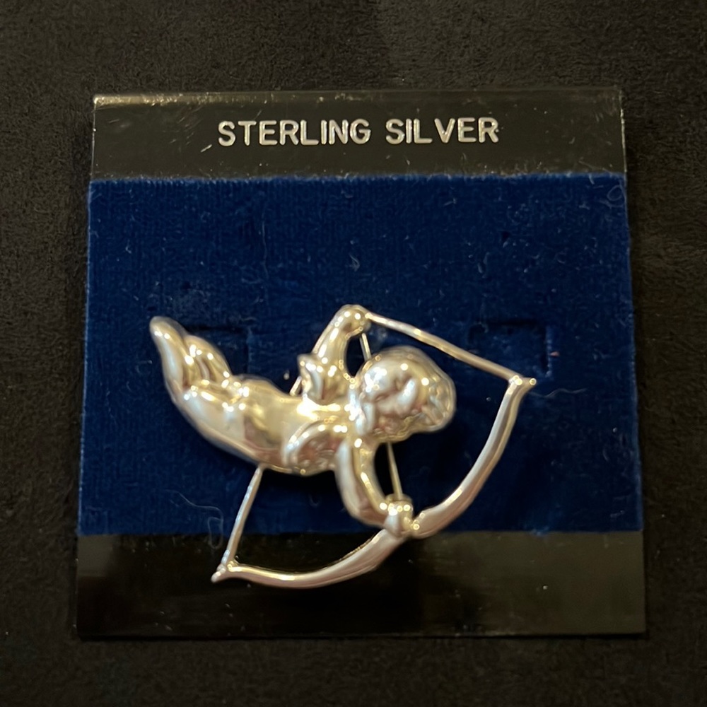 Vintage Sterling Silver stamped Cupid brooch NWT
